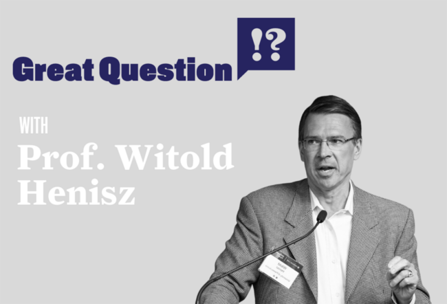 A grayscale image of a person speaking into a microphone, labeled as "Prof. Witold Henisz." The text above reads "Great Question."